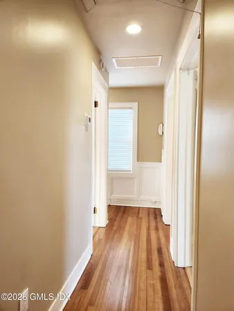 a spacious bathroom with a large tub and sink