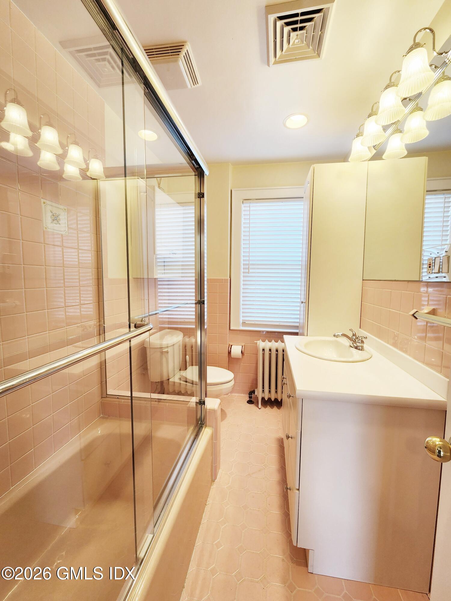34 Harold Street Cos Cob, CT 06807 - Photo 15 of 25 a spacious bathroom with a large tub and sink