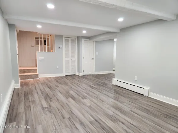 a kitchen with stainless steel appliances granite countertop a sink and cabinets