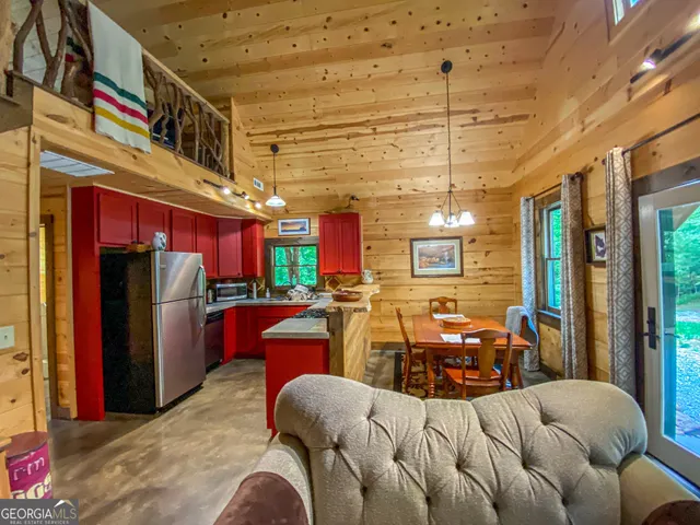 a bed room with furniture and a window