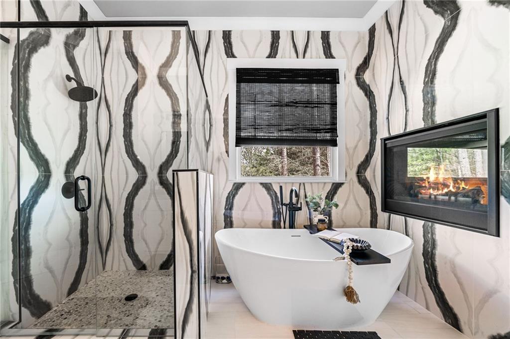 8215 Highway 81 Bethlehem, GA 30620 - Photo 28 of 60 a view of living room with a couch and a floor to ceiling window