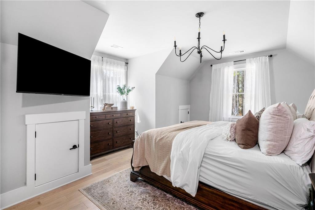 8215 Highway 81 Bethlehem, GA 30620 - Photo 37 of 60 a bedroom with a bed and a flat screen tv