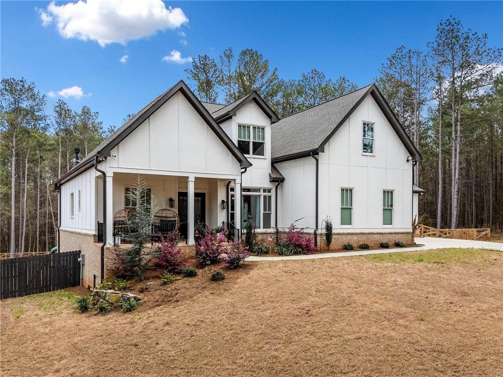 8215 Highway 81 Bethlehem, GA 30620 - Photo 4 of 60 a view of a house with yard and sitting area
