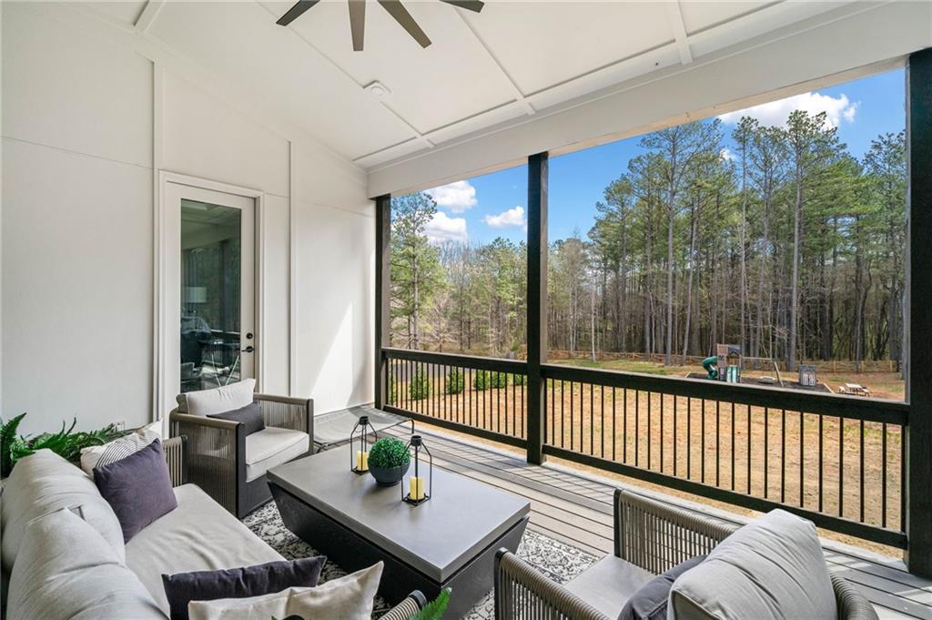 8215 Highway 81 Bethlehem, GA 30620 - Photo 4 of 57 a living room with furniture and a large window