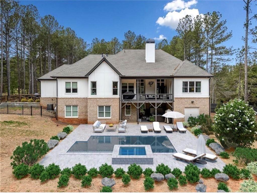 8215 Highway 81 Bethlehem, GA 30620 - Photo 46 of 60 a front view of a house with garden