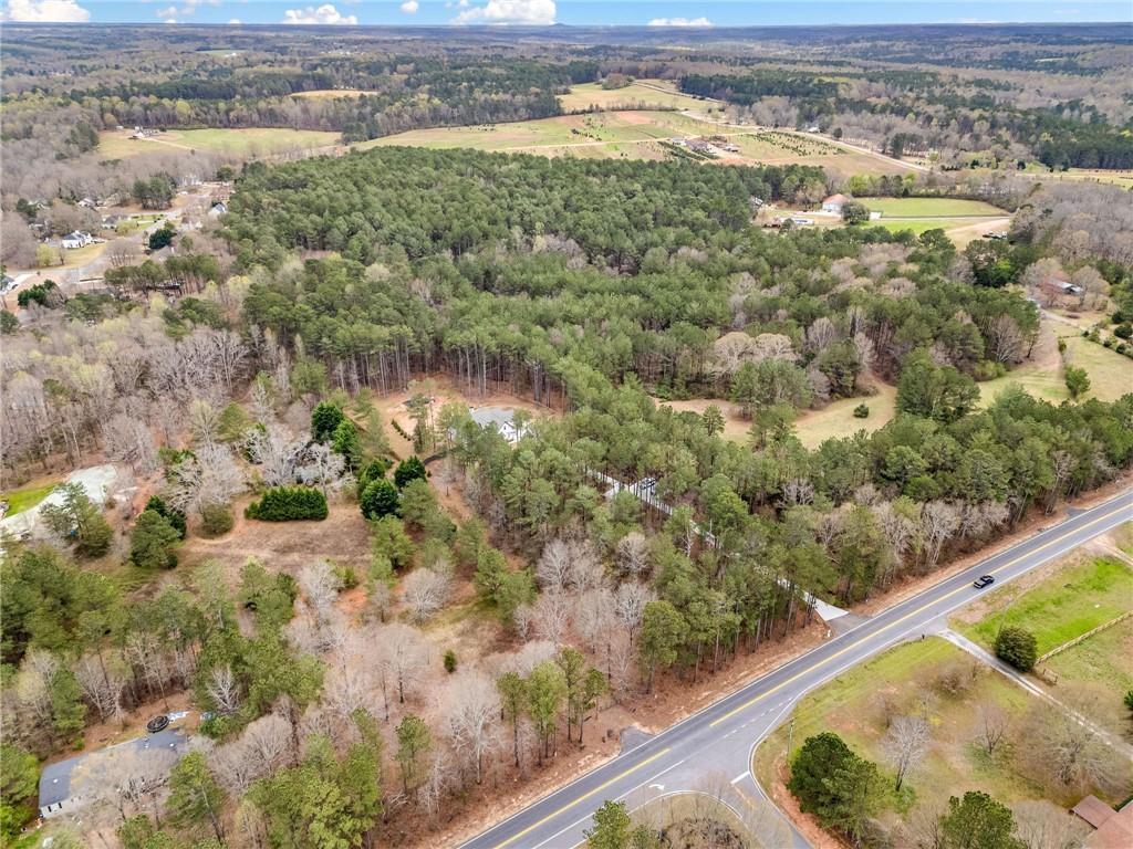 8215 Highway 81 Bethlehem, GA 30620 - Photo 50 of 60 a view of a lake with an outdoor space