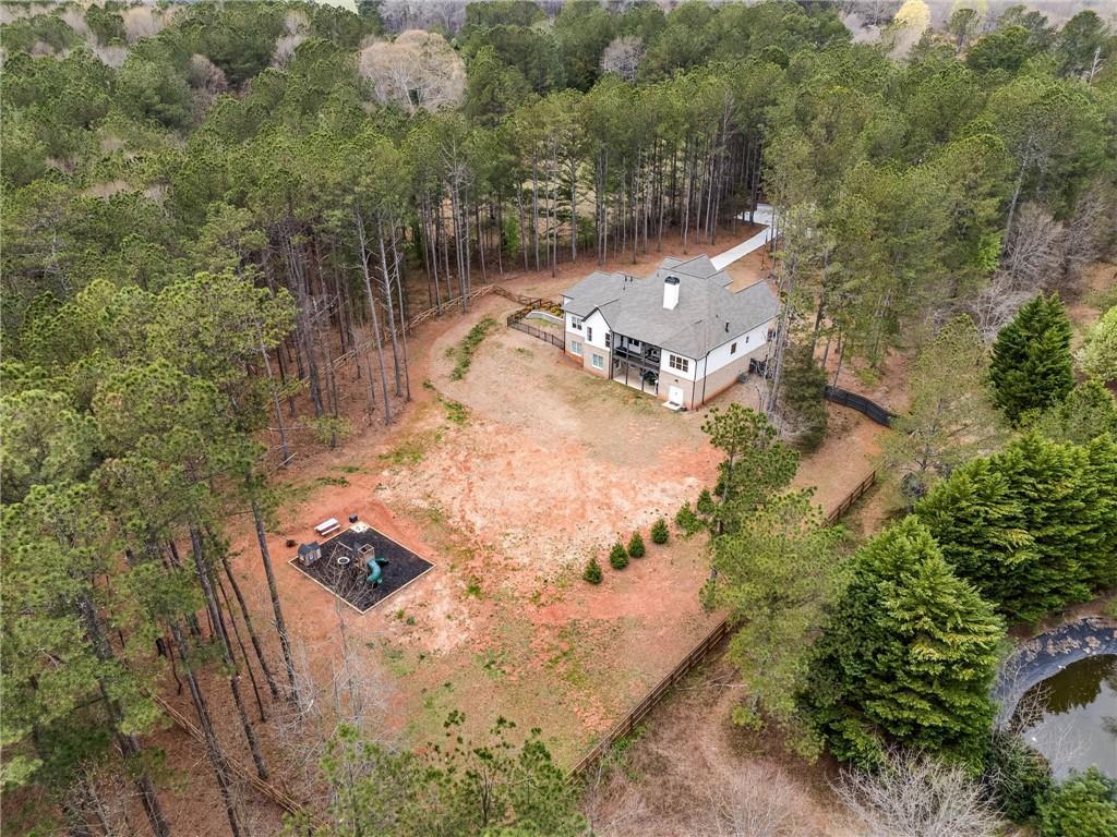 8215 Highway 81 Bethlehem, GA 30620 - Photo 52 of 60 an aerial view of a house with a yard