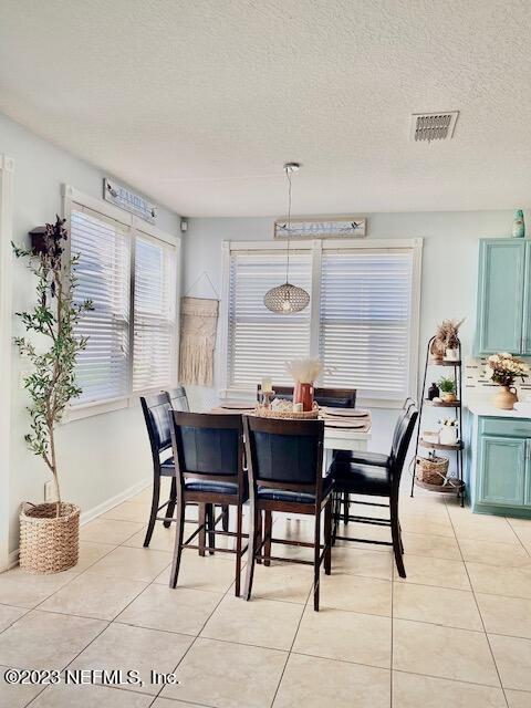 3949 Ringneck Drive Jacksonville, FL 32226 - Photo 3 of 16 a dining room with furniture and window