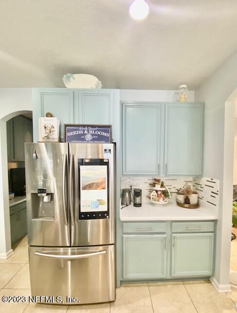 3949 Ringneck Drive Jacksonville, FL 32226 - Photo 5 of 16 a kitchen with a refrigerator and cabinets