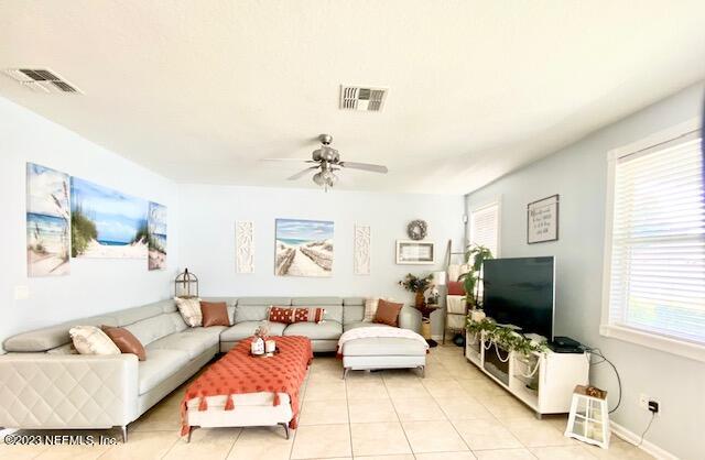 3949 Ringneck Drive Jacksonville, FL 32226 - Photo 7 of 16 a living room with furniture and a flat screen tv