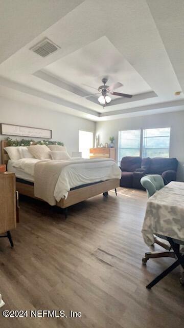 3949 Ringneck Drive Jacksonville, FL 32226 - Photo 9 of 16 a spacious bedroom with a bed and a large window