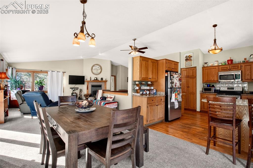 1445 Sutherland Creek Road Manitou Springs, CO 80829 - Photo 13 of 43 a view of a dining room with furniture