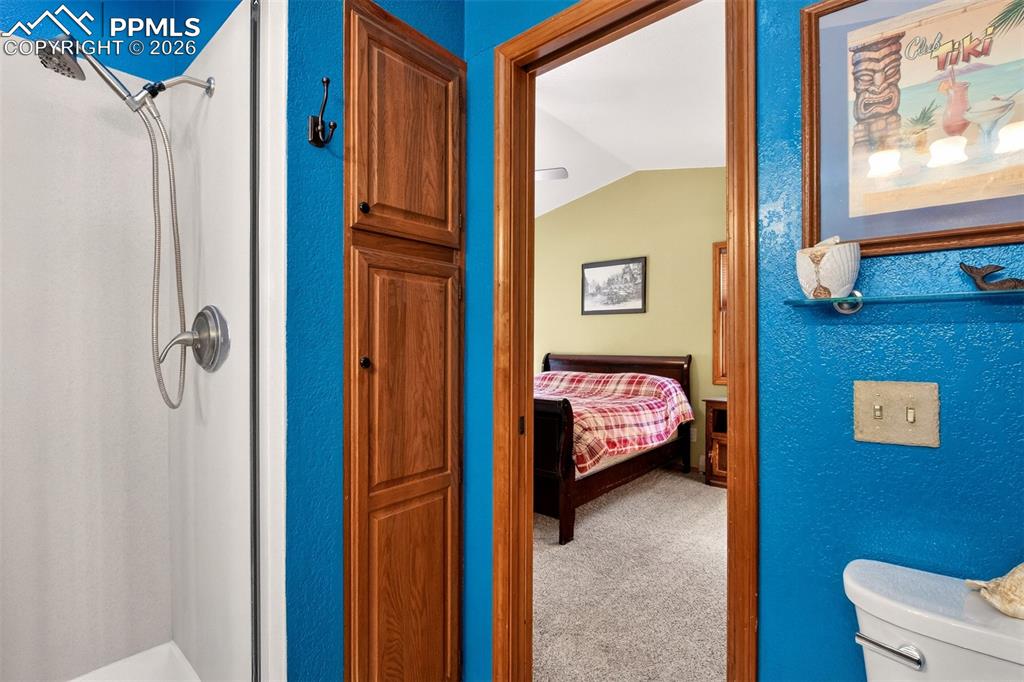 1445 Sutherland Creek Road Manitou Springs, CO 80829 - Photo 19 of 43 a view of a hallway with front door