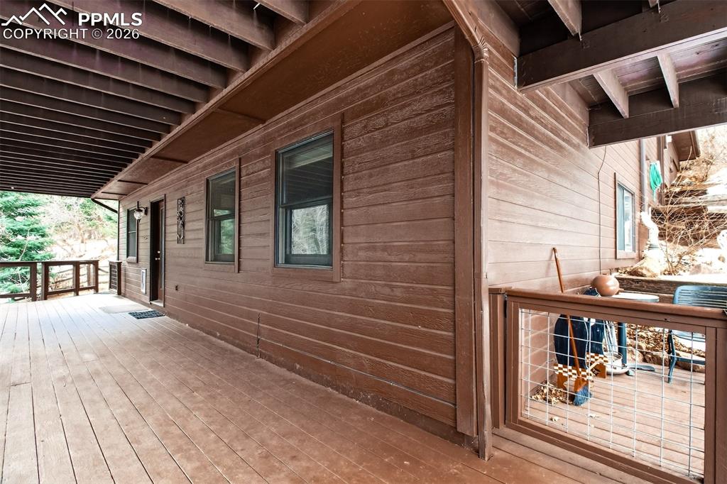 1445 Sutherland Creek Road Manitou Springs, CO 80829 - Photo 34 of 43 a view of livingroom with furniture and large windows