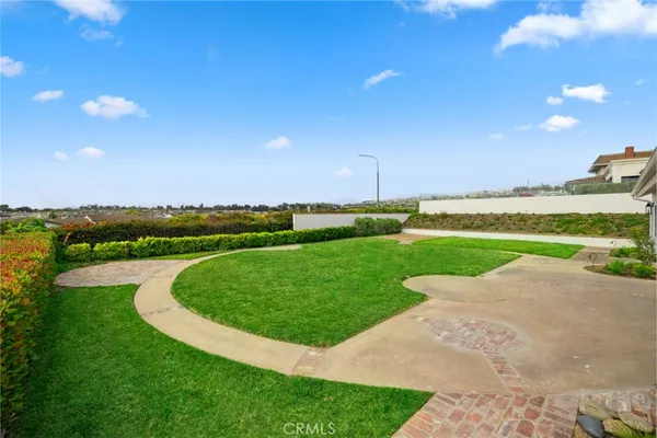 a view of a golf course with a lake