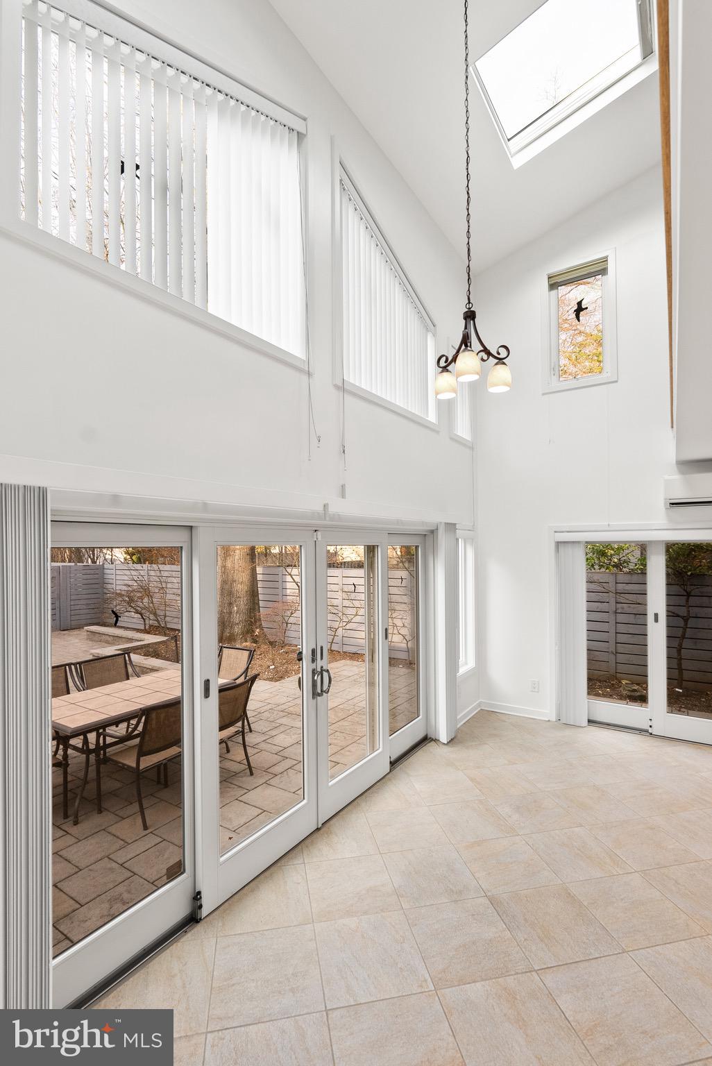 4854 Reservoir Road Northwest Washington, DC 20007 - Photo 22 of 53 Two story sunroom provides light and bonus space