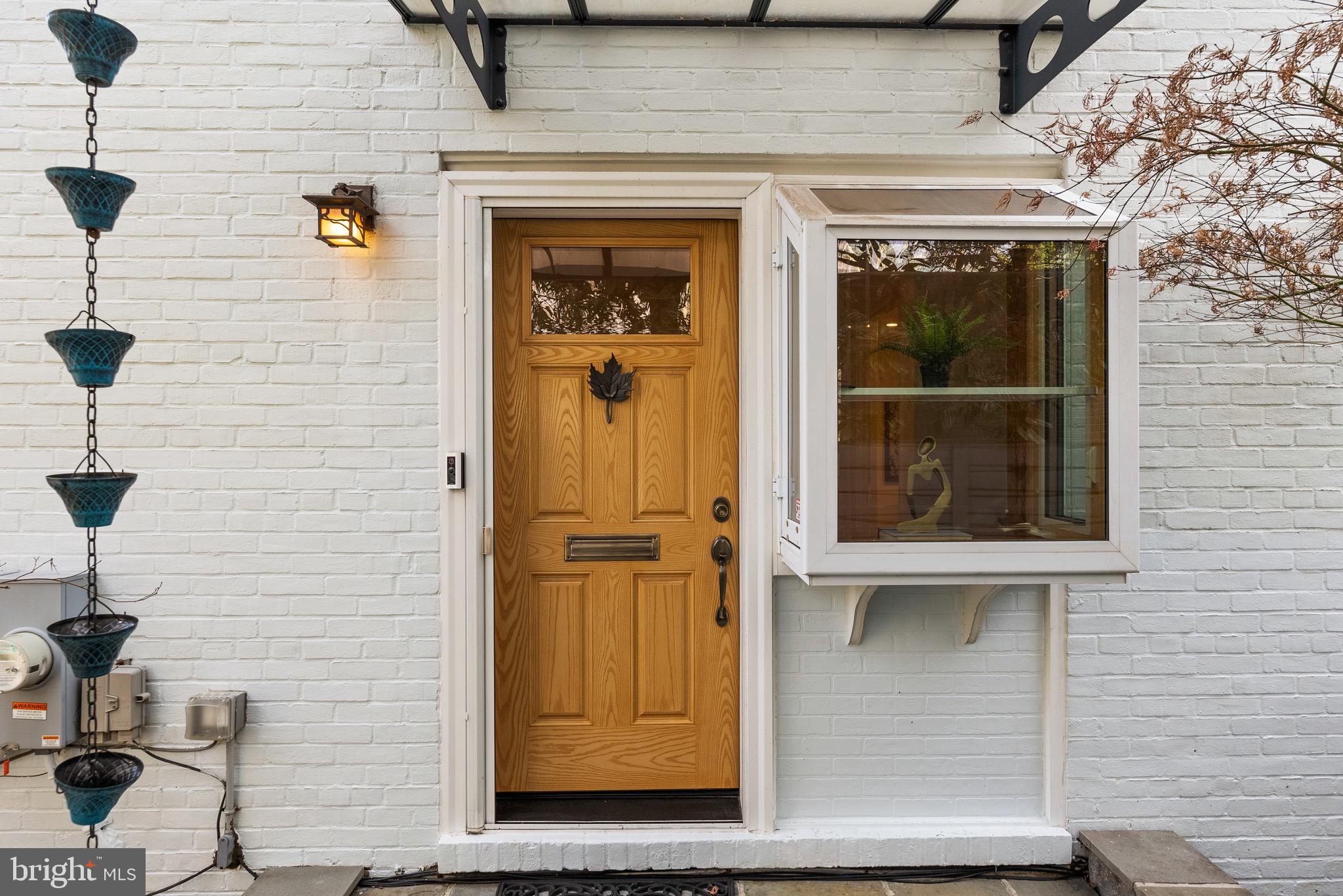 4854 Reservoir Road Northwest Washington, DC 20007 - Photo 3 of 53 Thoughtful entry awning