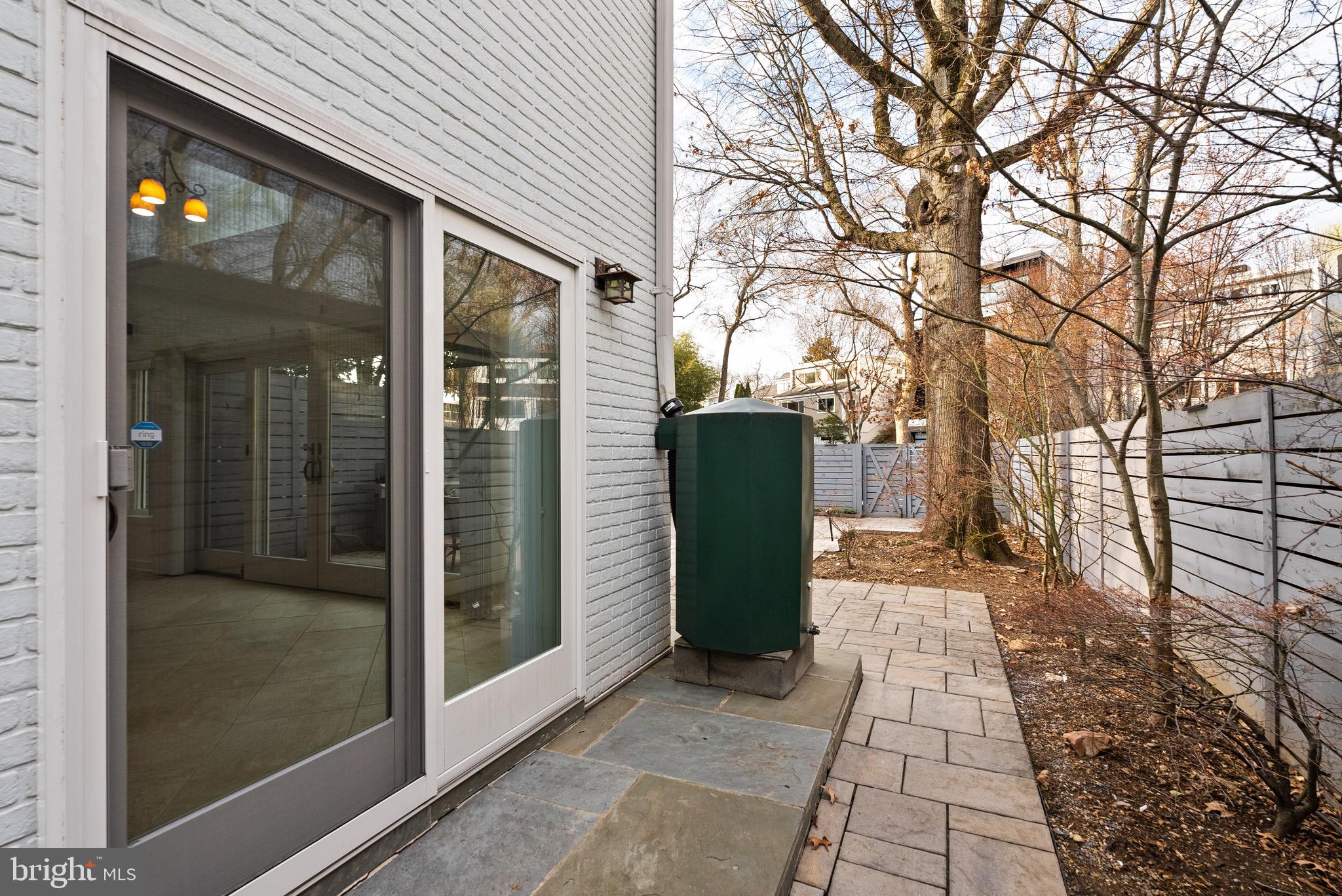 4854 Reservoir Road Northwest Washington, DC 20007 - Photo 31 of 53 Rain barrels tied into Rain catchment system