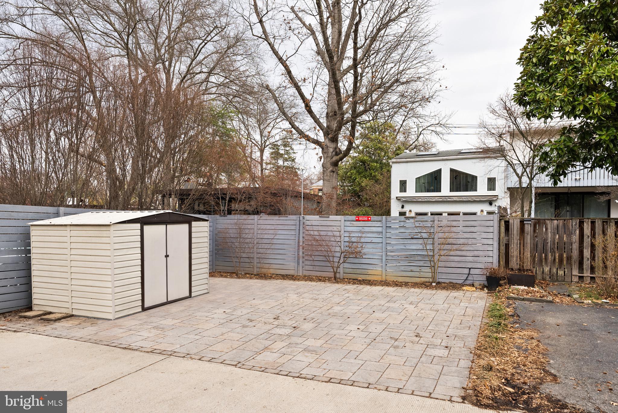 4854 Reservoir Road Northwest Washington, DC 20007 - Photo 52 of 53 Spacious parking pad over permeable rain basin