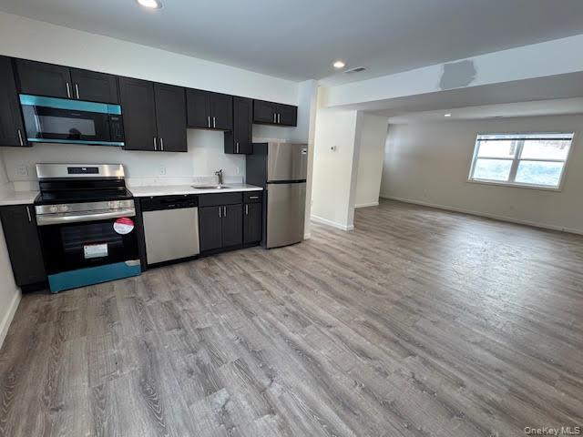 11 Alexandra Matthews Road, Unit A Wallkill, NY 12589 - Photo 5 of 43 Spacious and funny with all appliances.