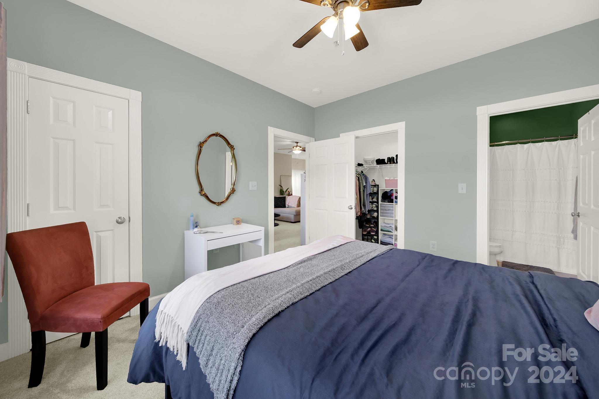 8959 Meadow Vista Road Charlotte, NC 28213 - Photo 19 of 32 a bedroom with a bed a chair and piano