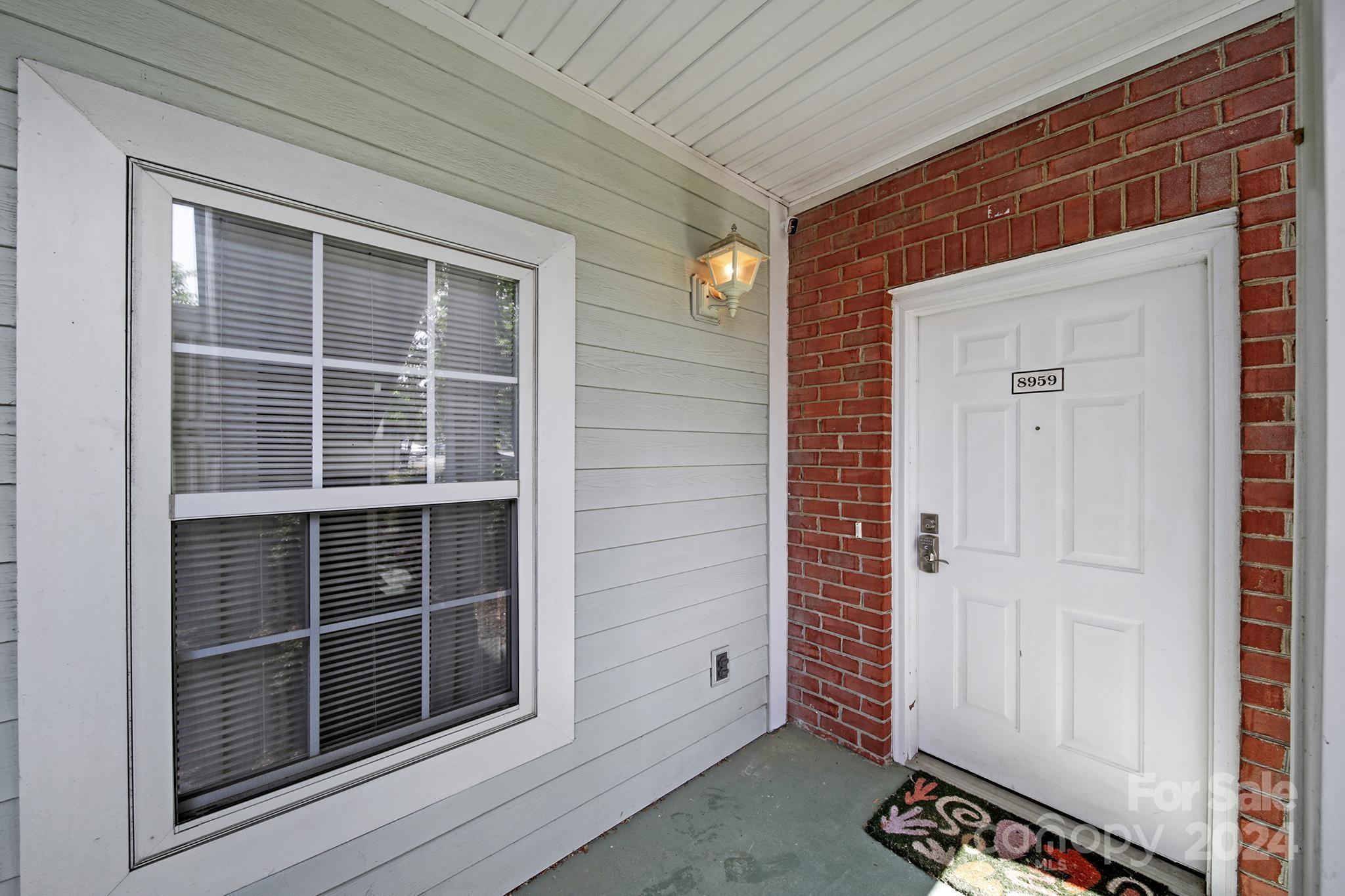8959 Meadow Vista Road Charlotte, NC 28213 - Photo 2 of 32 a view of front door