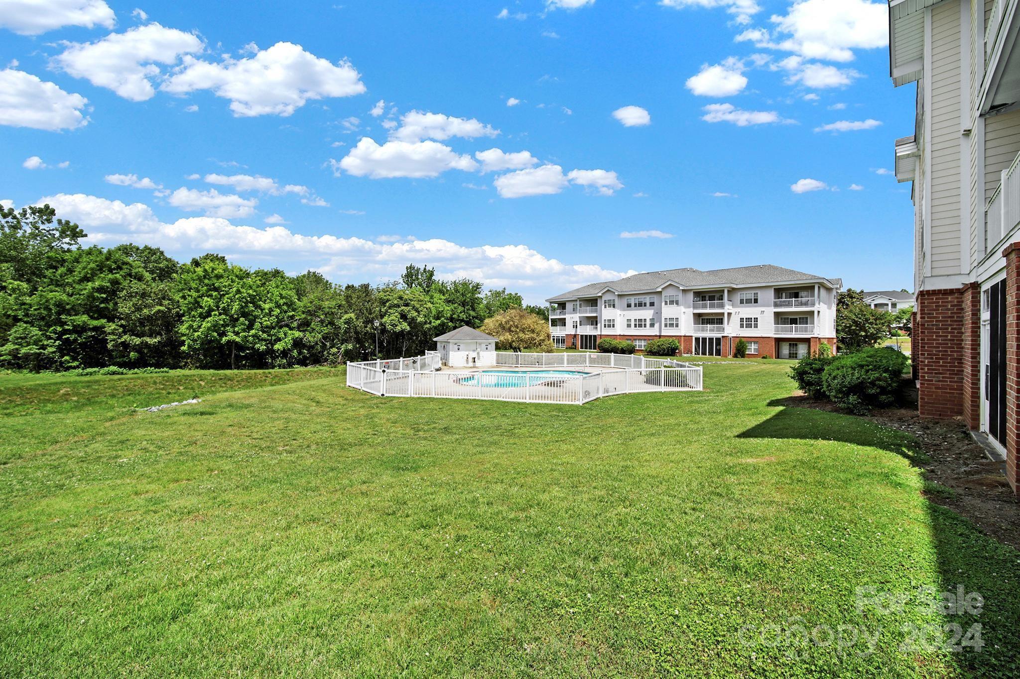 8959 Meadow Vista Road Charlotte, NC 28213 - Photo 26 of 32 a view of a house with a big yard