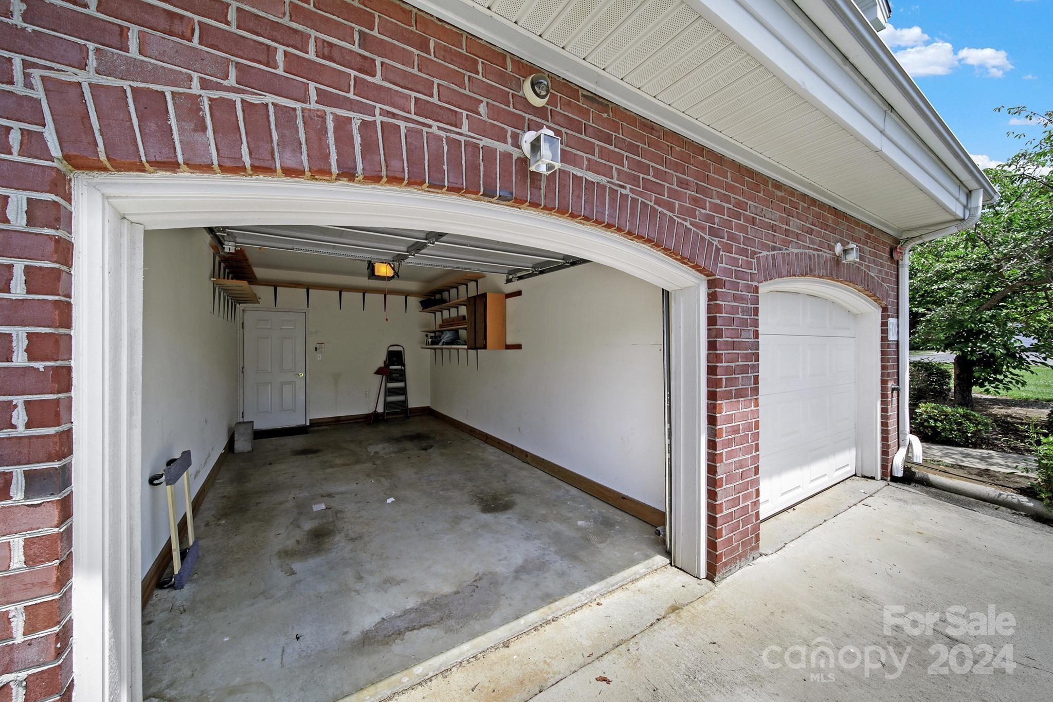 8959 Meadow Vista Road Charlotte, NC 28213 - Photo 28 of 32 a view of a garage