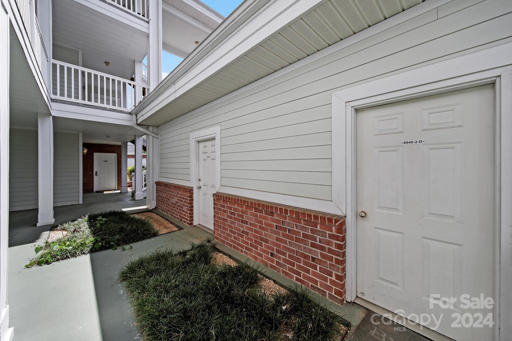 8959 Meadow Vista Road Charlotte, NC 28213 - Photo 3 of 32 a view of front door of house