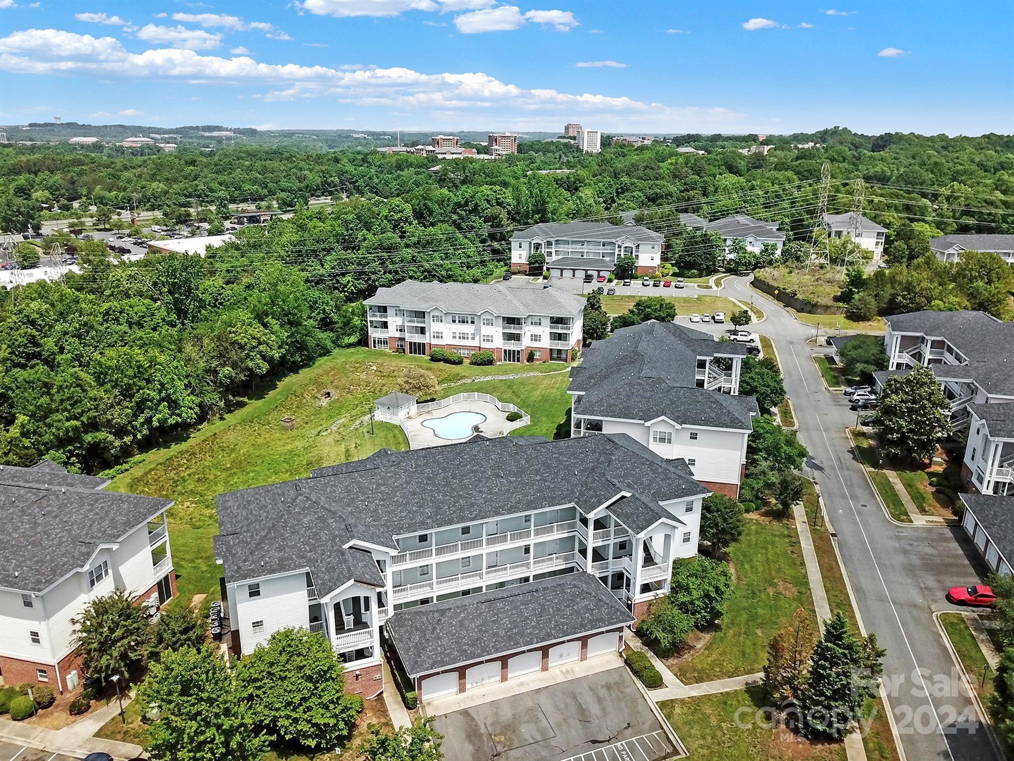 8959 Meadow Vista Road Charlotte, NC 28213 - Photo 31 of 32 an aerial view of a house with a garden