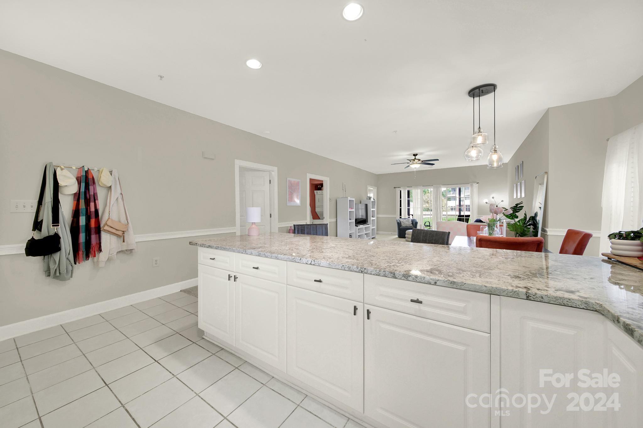 8959 Meadow Vista Road Charlotte, NC 28213 - Photo 6 of 32 a bathroom with a sink a mirror and shower
