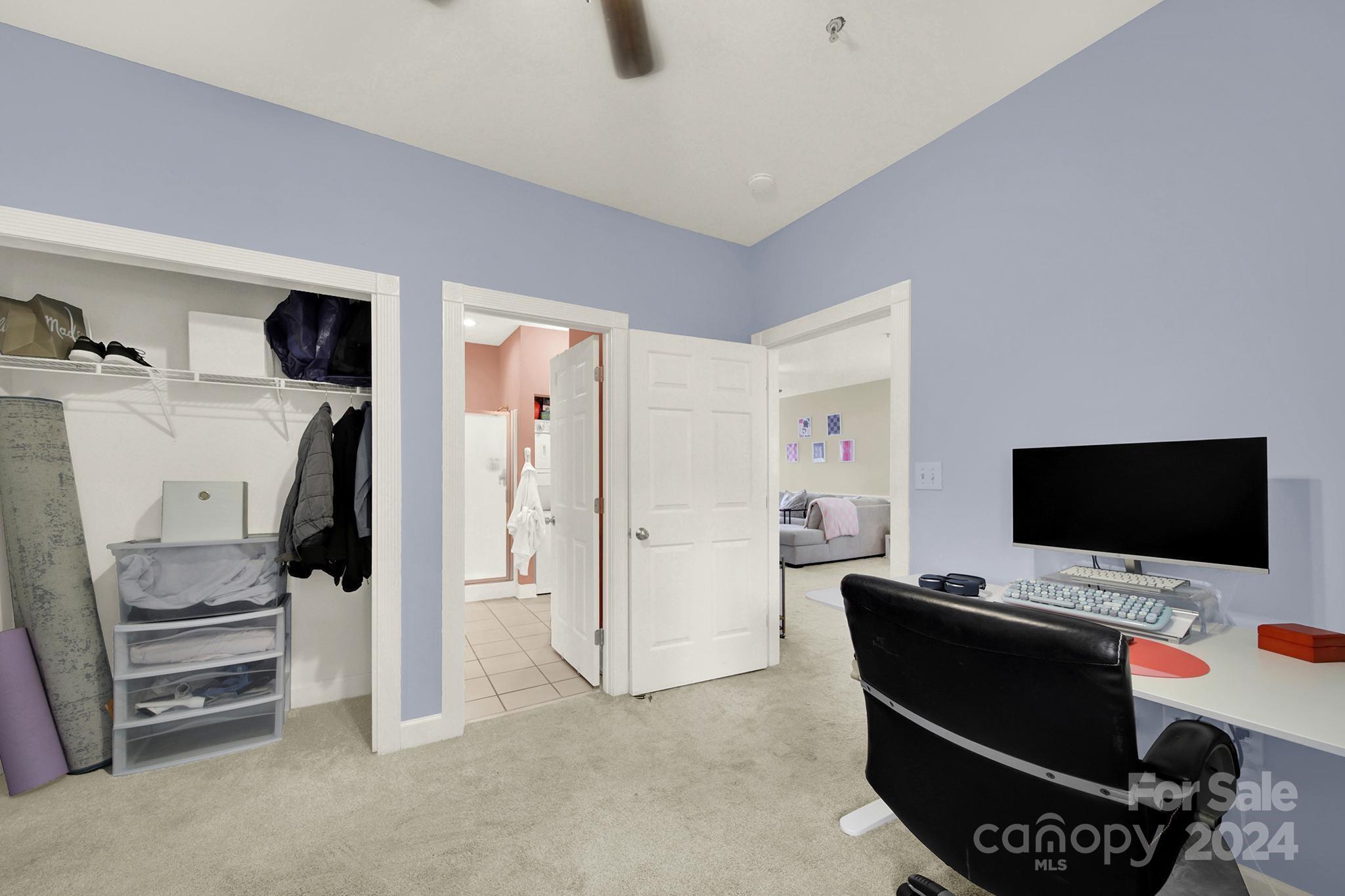 8959 Meadow Vista Road Charlotte, NC 28213 - Photo 10 of 32 a living room with furniture and a flat screen tv
