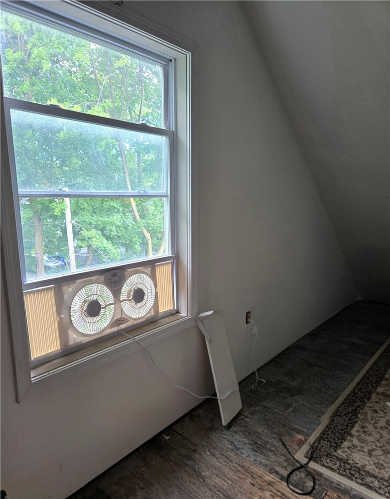 695-697 Culver Road Rochester, NY 14609 - Photo 21 of 50 There is an additional room with windows for additional storage.