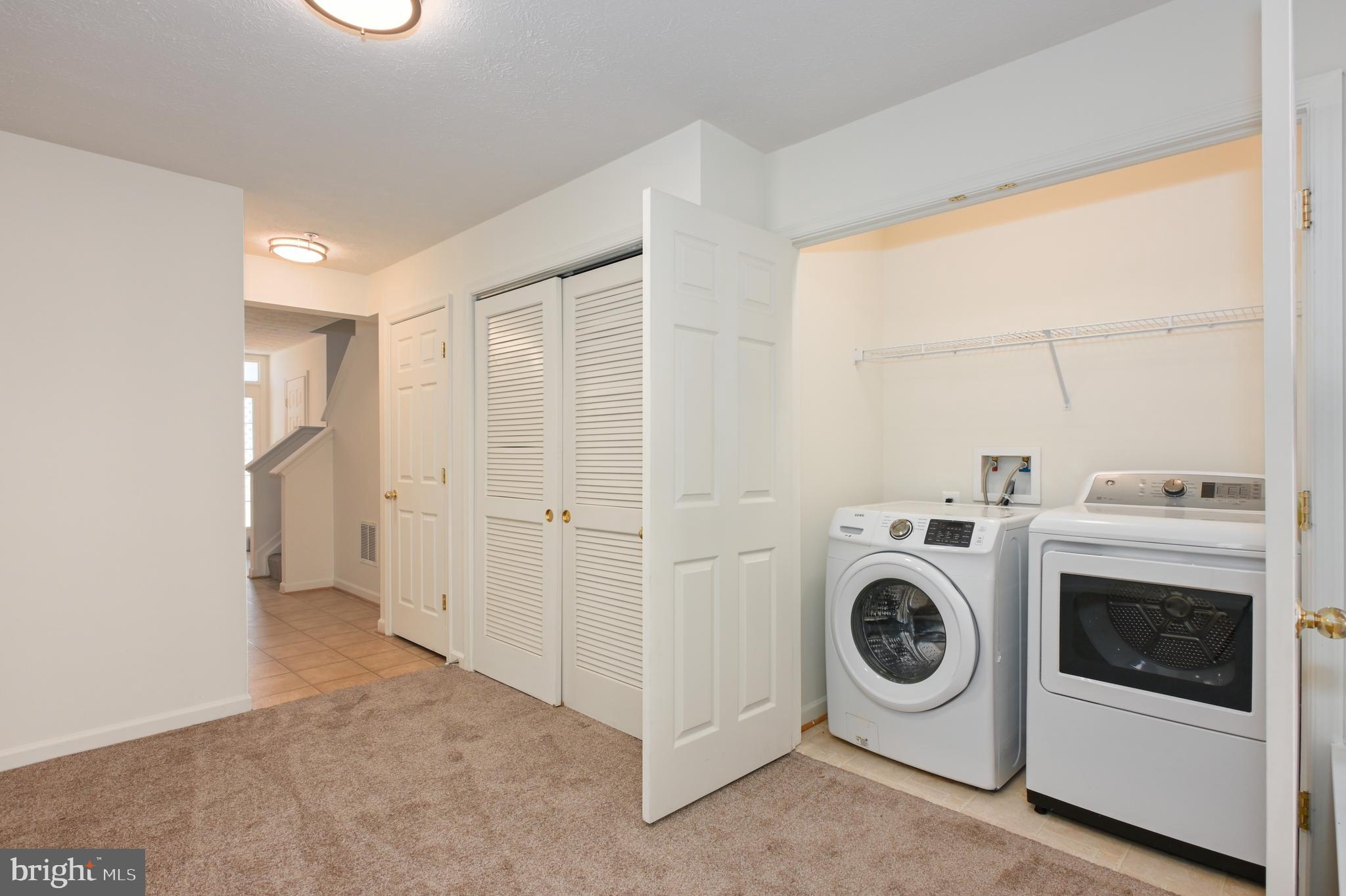 9871 Decatur Road Baltimore, MD 21220 - Photo 5 of 31 a utility room with dryer and washer