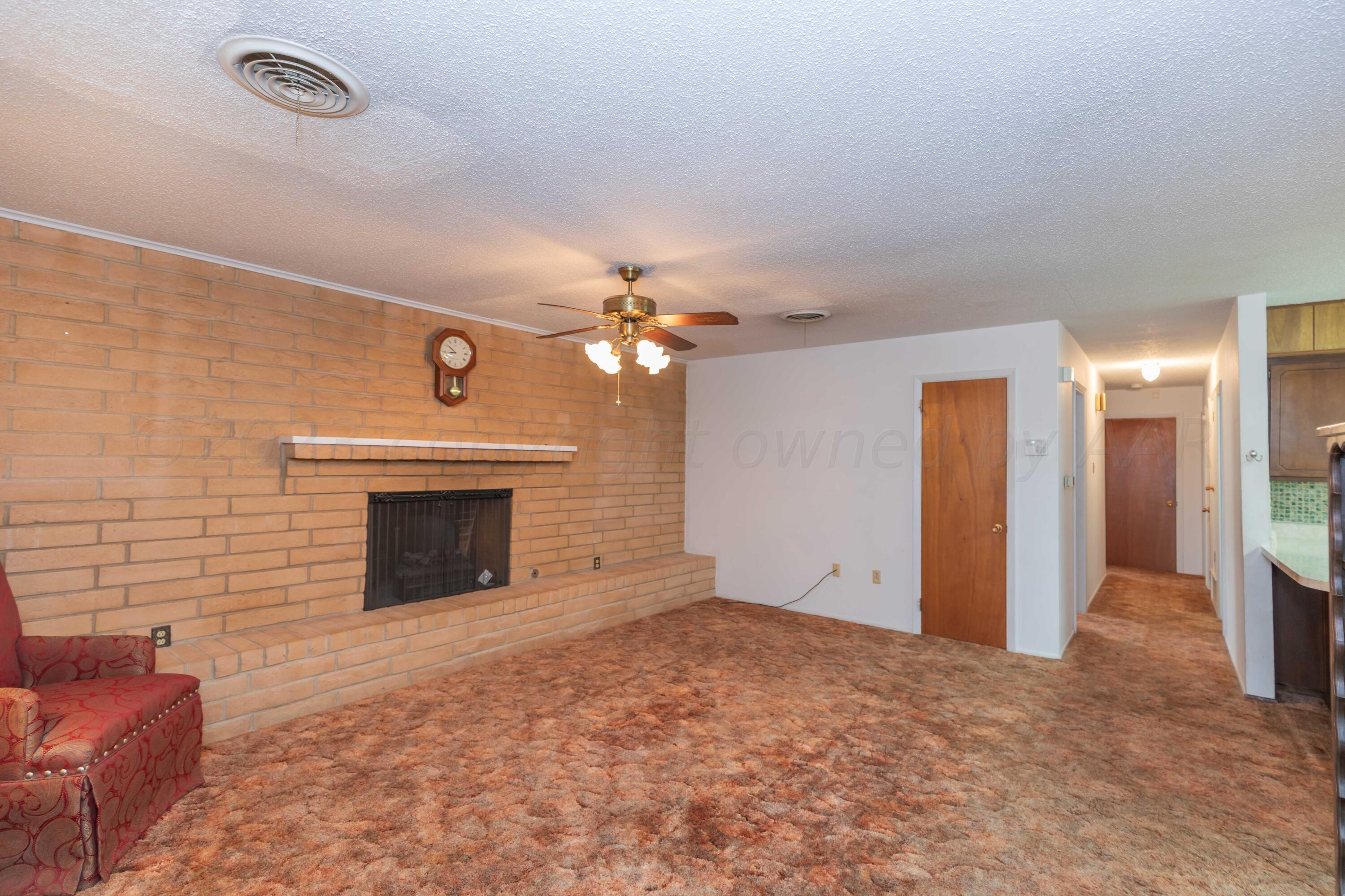 2819 Armand Street Amarillo, TX 79110 - Photo 6 of 42 LIVING ROOM VIEW 1