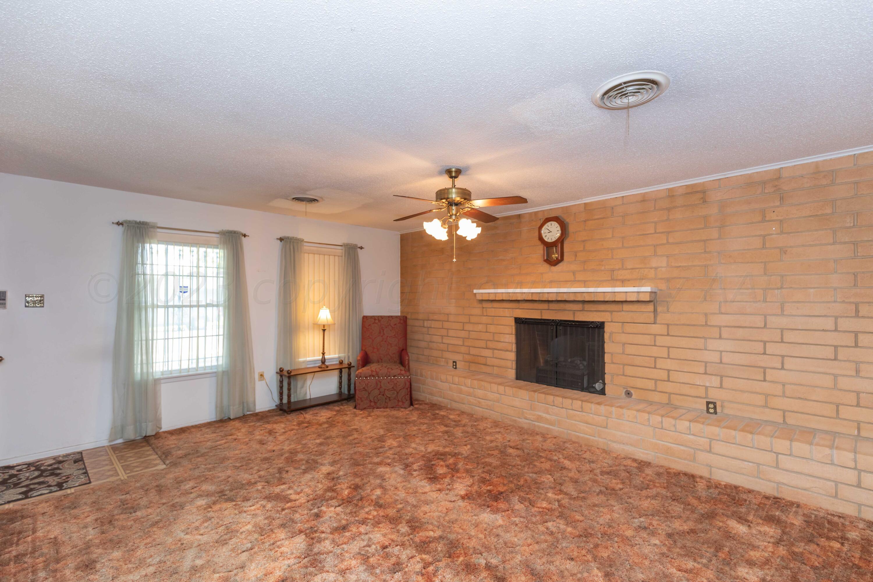2819 Armand Street Amarillo, TX 79110 - Photo 7 of 42 LIVING ROOM VIEW 2