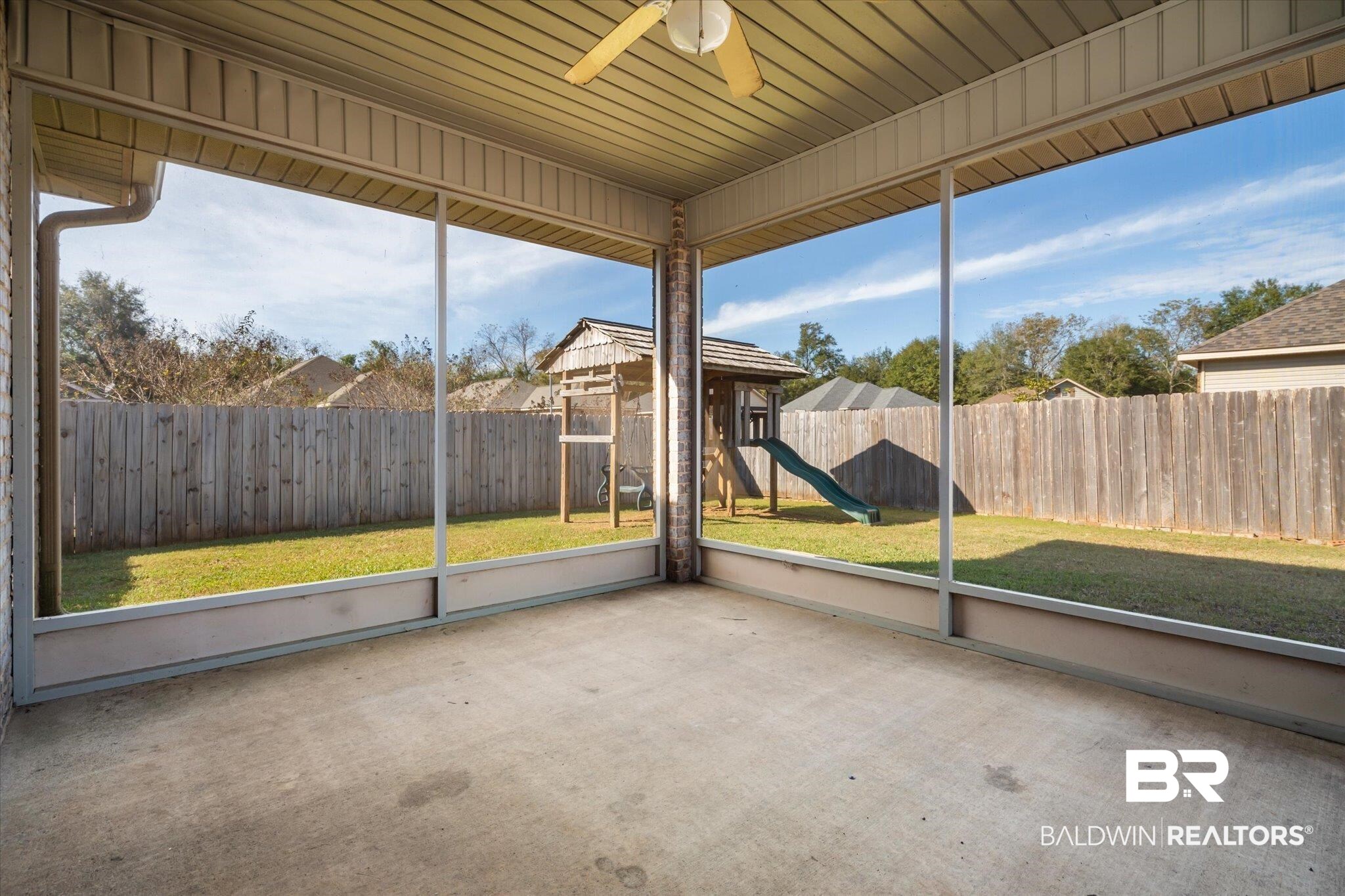 10251 Fionn Loop Daphne, AL 36526 - Photo 21 of 28 Unfurnished sunroom featuring ceiling fan and a healthy amount of sunlight