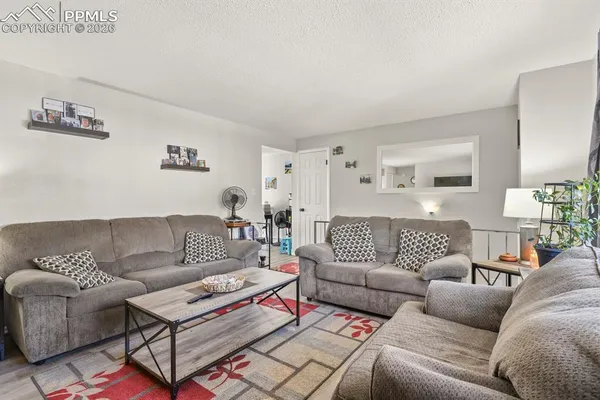 a living room with furniture and a couch
