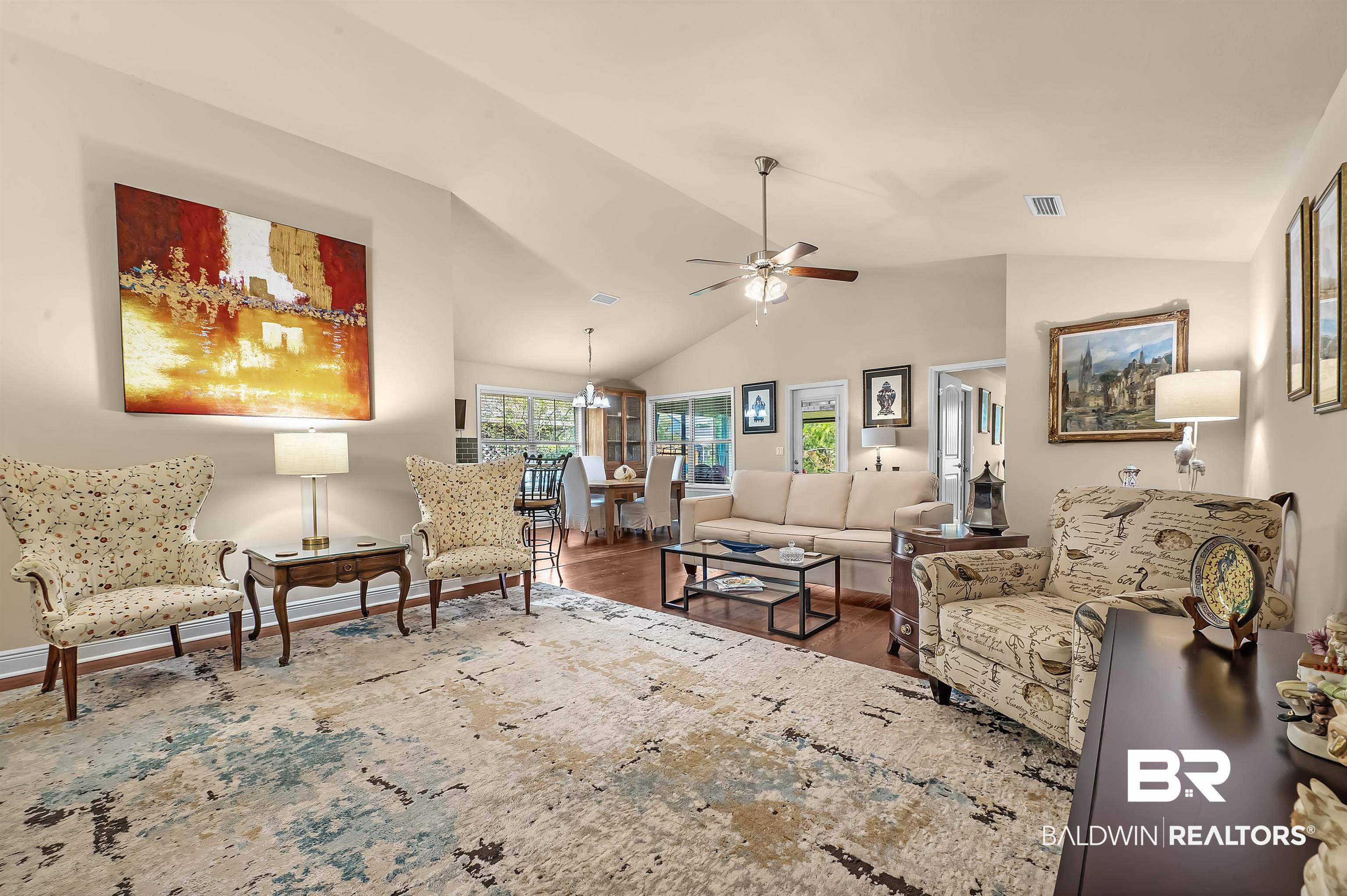 8896 Allay Lane Foley, AL 36535 - Photo 36 of 57 Living room featuring vaulted ceiling, dark hardwood / wood-style floors, and ceiling fan