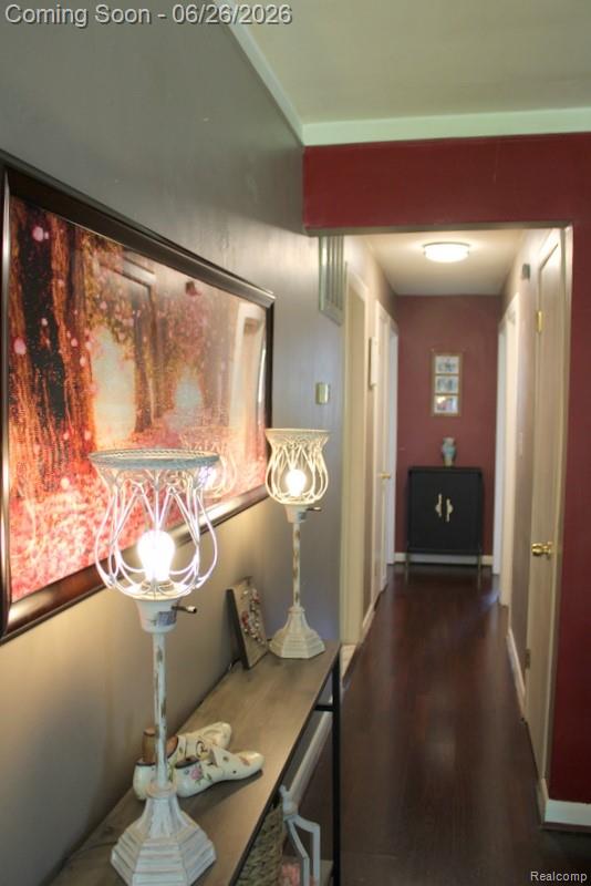 8951 Stevens Street Taylor, MI 48180 - Photo 19 of 32 ATTRACTIVE HARDWOOD STYLE PLANK FLOORING IN THE HALL!