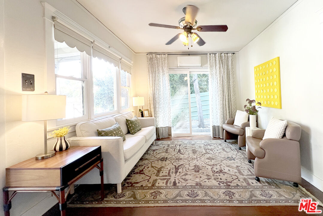 313 Museum Drive Los Angeles, CA 90065 - Photo 13 of 43 a living room with furniture and a large window