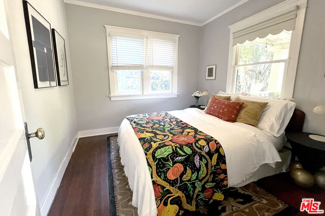 313 Museum Drive Los Angeles, CA 90065 - Photo 16 of 43 a bedroom with bed and a window