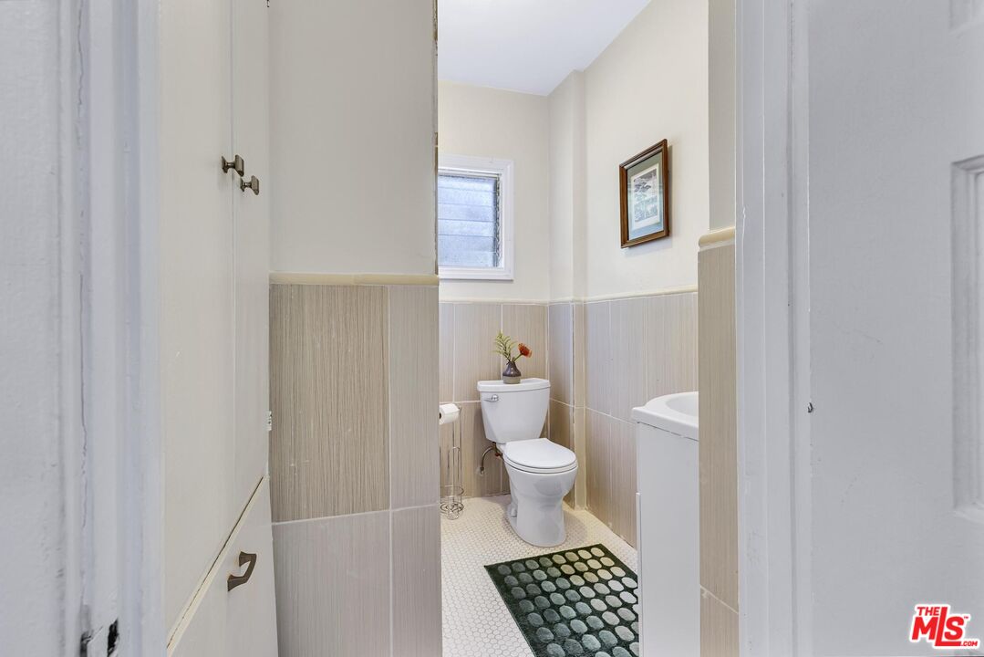 313 Museum Drive Los Angeles, CA 90065 - Photo 18 of 43 a bathroom with a sink and a toilet