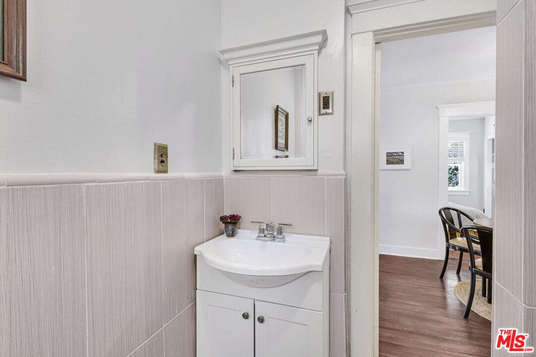 313 Museum Drive Los Angeles, CA 90065 - Photo 20 of 43 a bathroom with a sink and a mirror