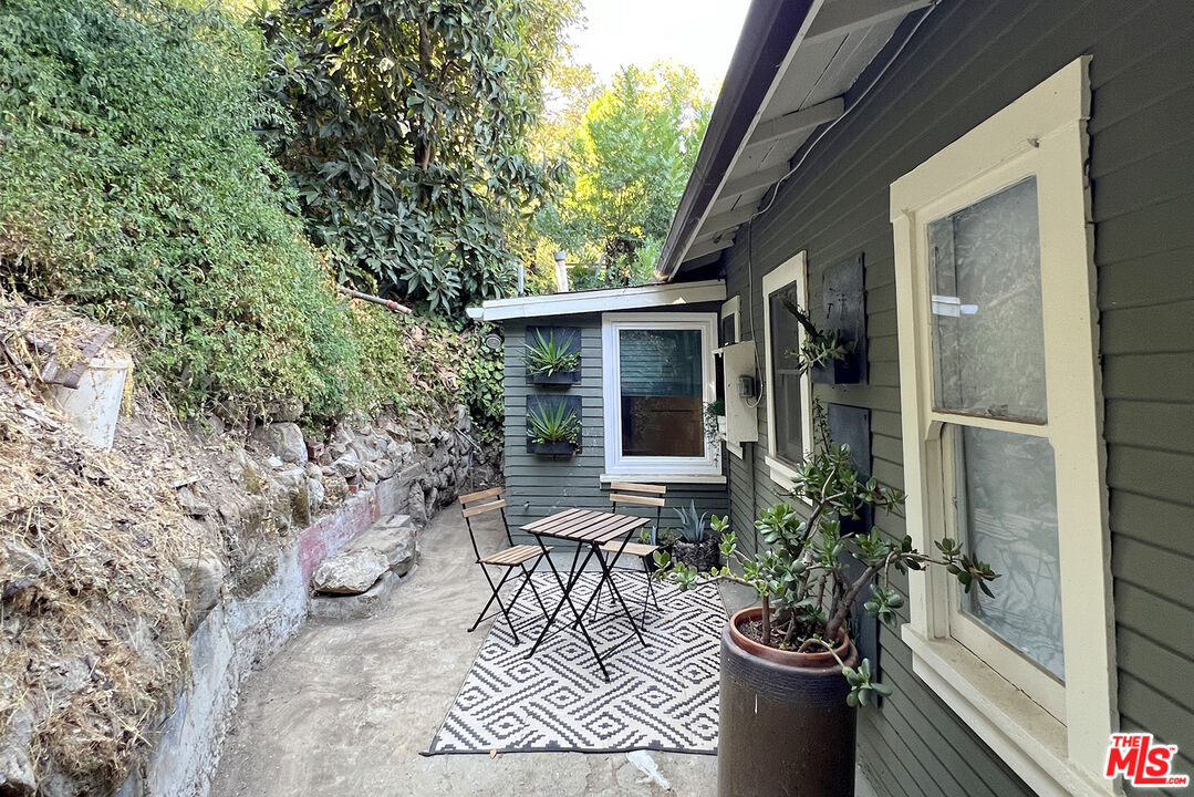 313 Museum Drive Los Angeles, CA 90065 - Photo 31 of 43 a view of balcony with chairs and potted plants