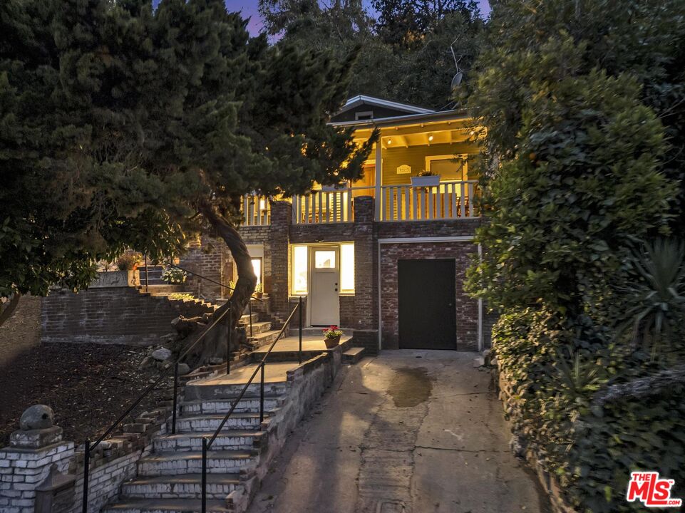 313 Museum Drive Los Angeles, CA 90065 - Photo 37 of 43 a view of a building with a tree