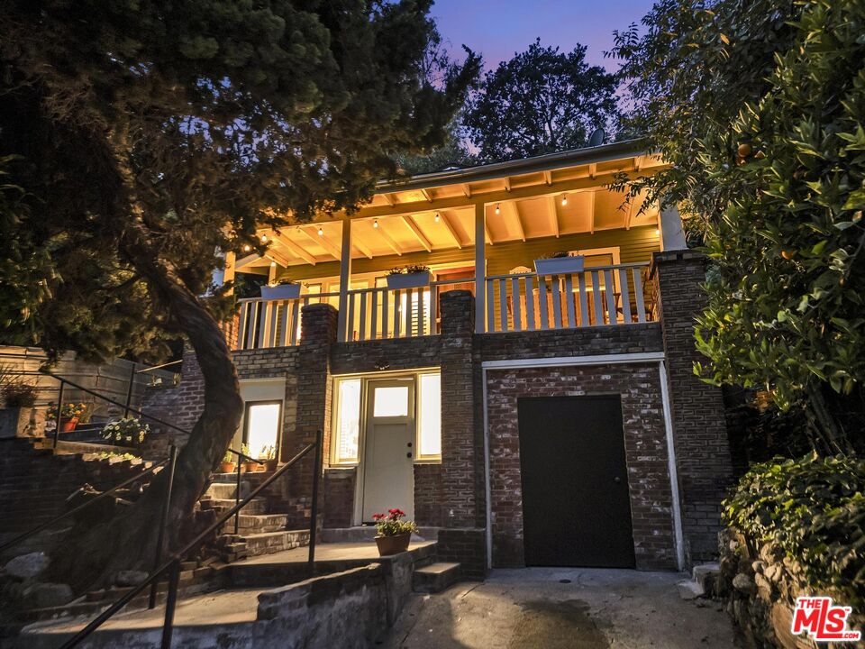 313 Museum Drive Los Angeles, CA 90065 - Photo 38 of 43 a front view of a house with a yard