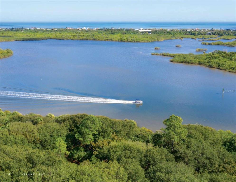 50 Coronado Road Flagler Beach, FL 32136 - Photo 6 of 16 a view of a lake and a beach
