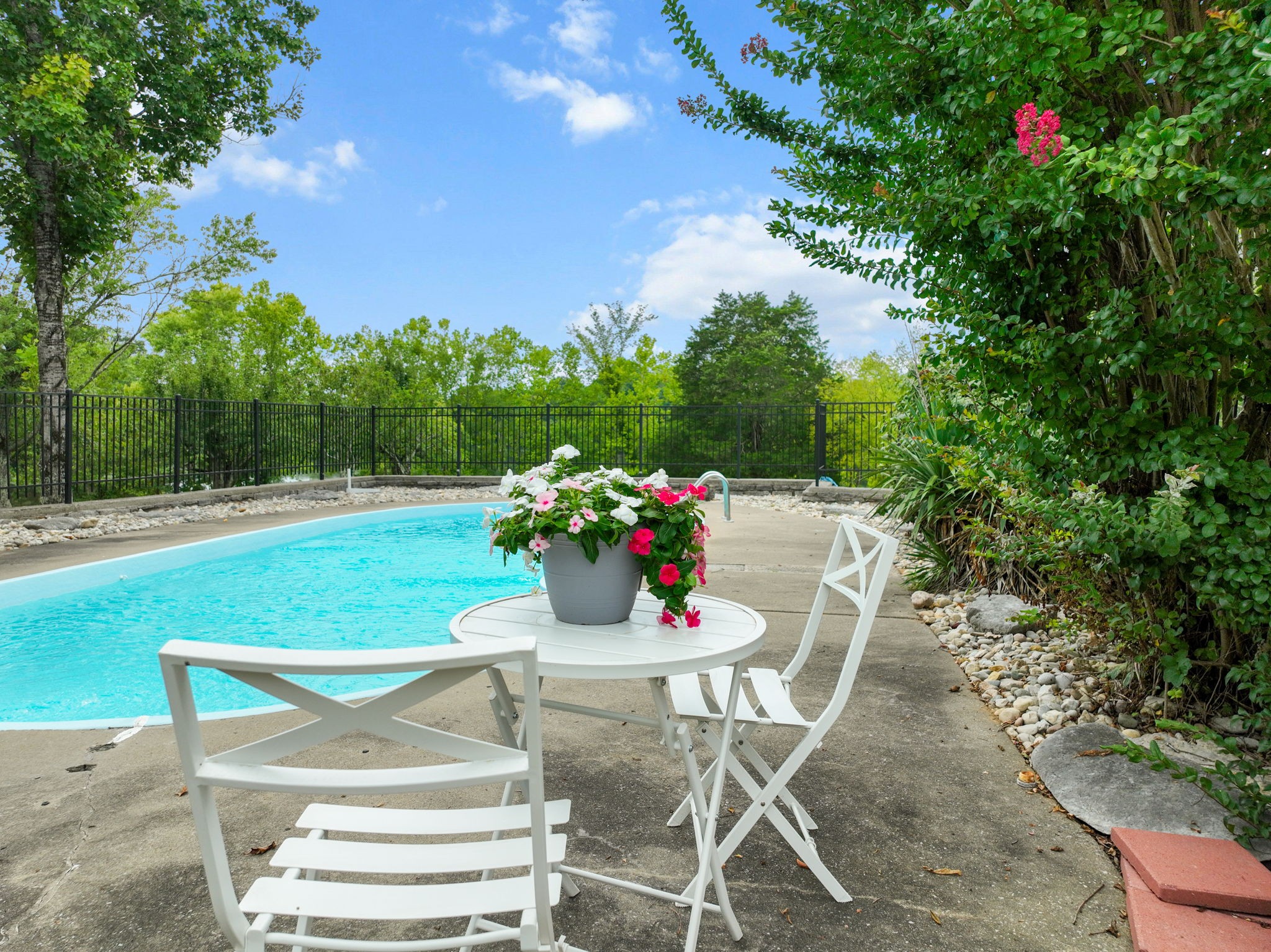 3443 Mann Road Lebanon, TN 37087 - Photo 20 of 55 a view of a chairs and table in the patio with a lake view