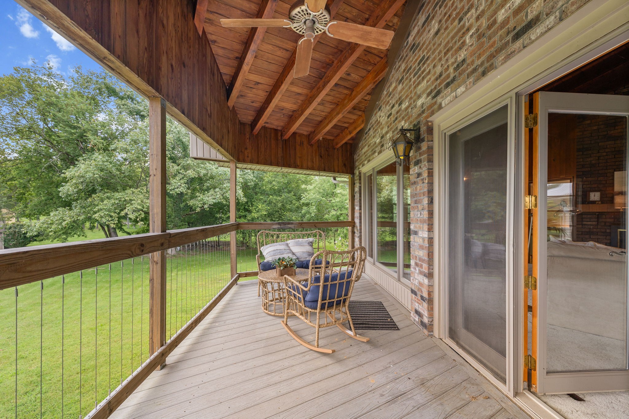 3443 Mann Road Lebanon, TN 37087 - Photo 30 of 55 a view of a balcony with chairs and wooden floor